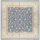 Wool Floral Area Rug in Blue/Beige