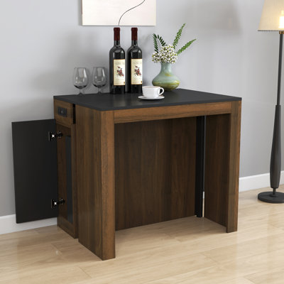 Table extensible moderne avec prise pour les mariages, les réunions de famille et les repas de tous les jours. Elle se double d'une console peu encombrante et se transforme en 5 panneaux d'extension pleine grandeur. Structure de salle à manger avec rangement intégré
