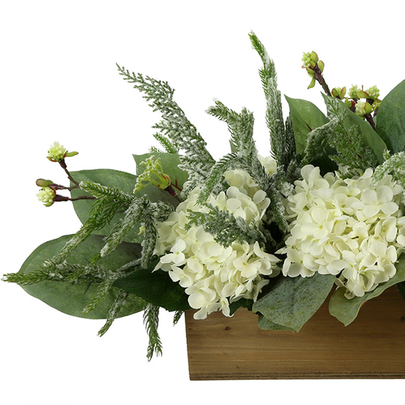 Holiday Arrangement with Wintry Greens and Hydrangeas
