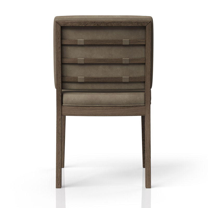 Ensemble de deux fauteuils à dossier souple en cuir