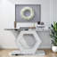 Sparkling Console Table With Diamond Glass Effects And Geometric Hexagon Cutouts