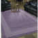 Tapis mauve en laine touffeté