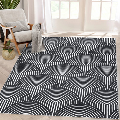 Jilliana Washable Geometric Machine Woven Polyester Area Rug in Black