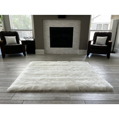 Square Mar Vista Solid Color Machine Woven Faux Sheepskin Area Rug in White