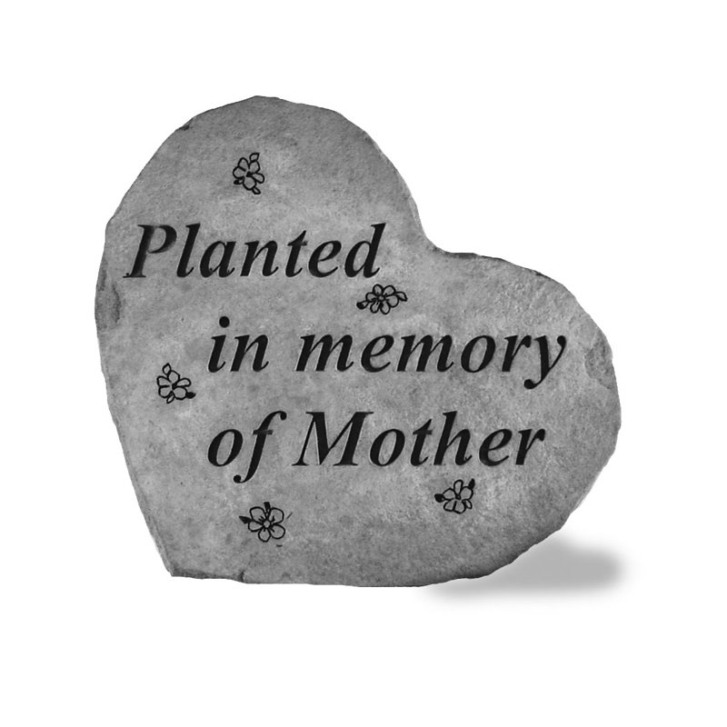 Hadis planté en mémoire de cœur de pierre de jardin