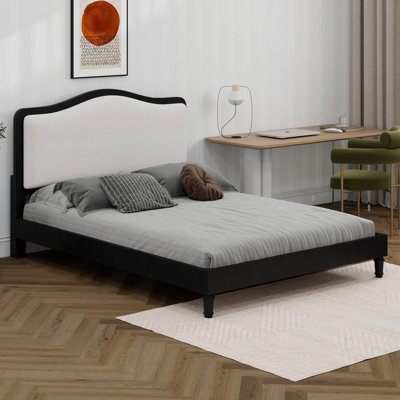 Structure de grand lit avec tête de lit tapissier courbée et lit plateforme en bois massif