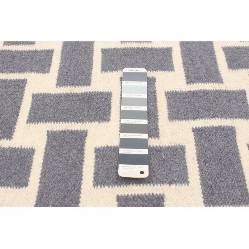 Tapis gris foncé en laine à tissage plat Cheboygan