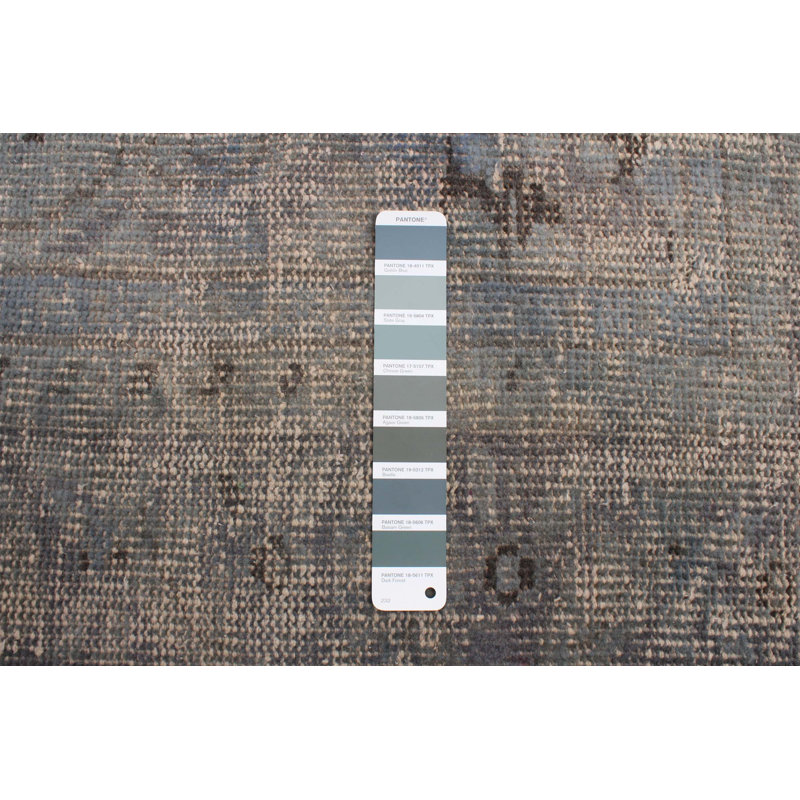 Tapis bleu clair et gris clair 7 pi x 10 pi 3 po
