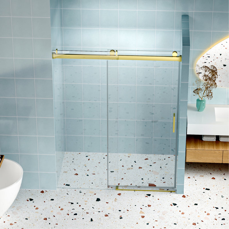 La porte de douche de 55 à 60 po x 76 po, dorée, en verre trempé de 1/4 po, assure un fonctionnement silencieux avec des roulettes réductrices de bruit, spécialement conçues pour la commodité