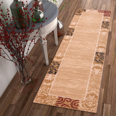 Tapis ivoire / beige à motif floral Sabin