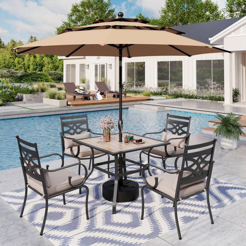 Anjanette 4 - Person Patio Dining Set with Square Table , Cushions Included, Beige