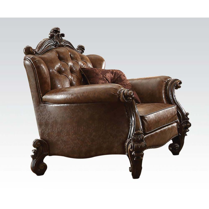 Fauteuil capitonné Aizlyn