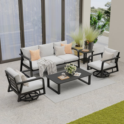 FR Un canapé trois places + deux chaises berçantes pivotantes + une grande table basse + une petite table basse