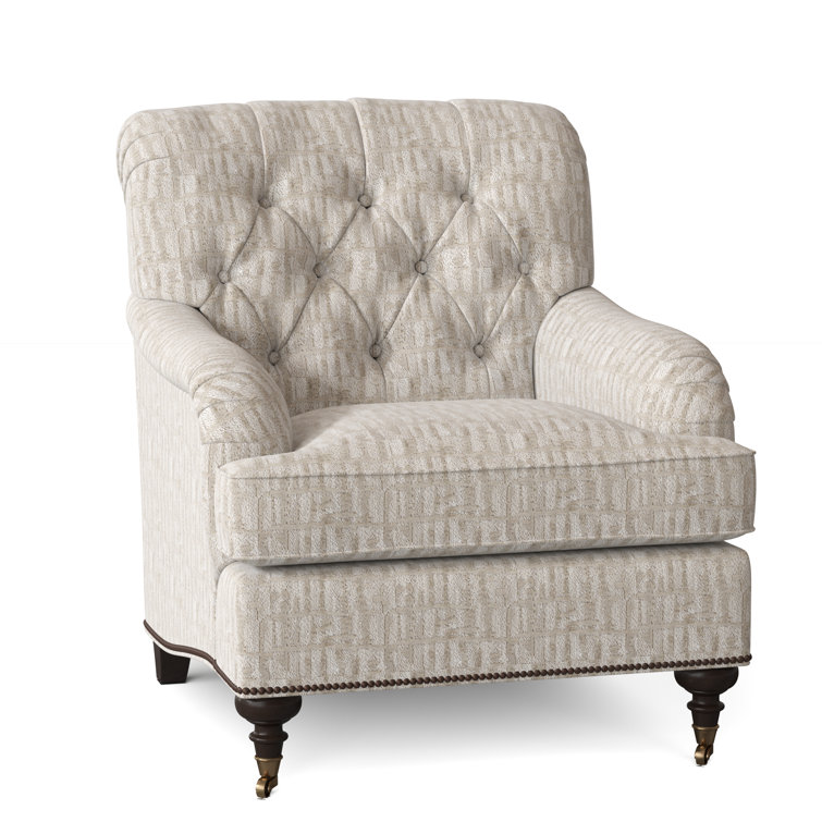 Fauteuil à coussin en duvet capitonné Devan