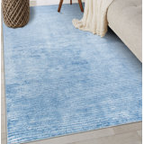 Tapis bleu performance tissé à plat à rayures Araceli