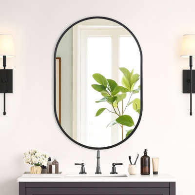 Miroir mural ovale en métal