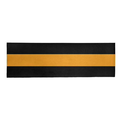 Tapis noir/jaune rayé
