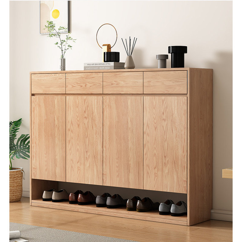 Meuble à chaussures en bois naturel avec tiroirs, portes et tablette inférieure ouverte, idéal pour l'entrée, le corridor ou la décoration intérieure.