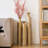 Set Of Three Distressed Metal Decorative Vases With Etched Vine Motifs, Tall Centerpiece Vases For Elegant Home Styling.