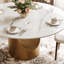 Table de salle à manger 59 "à dessus rond en pierre avec base en métal doré