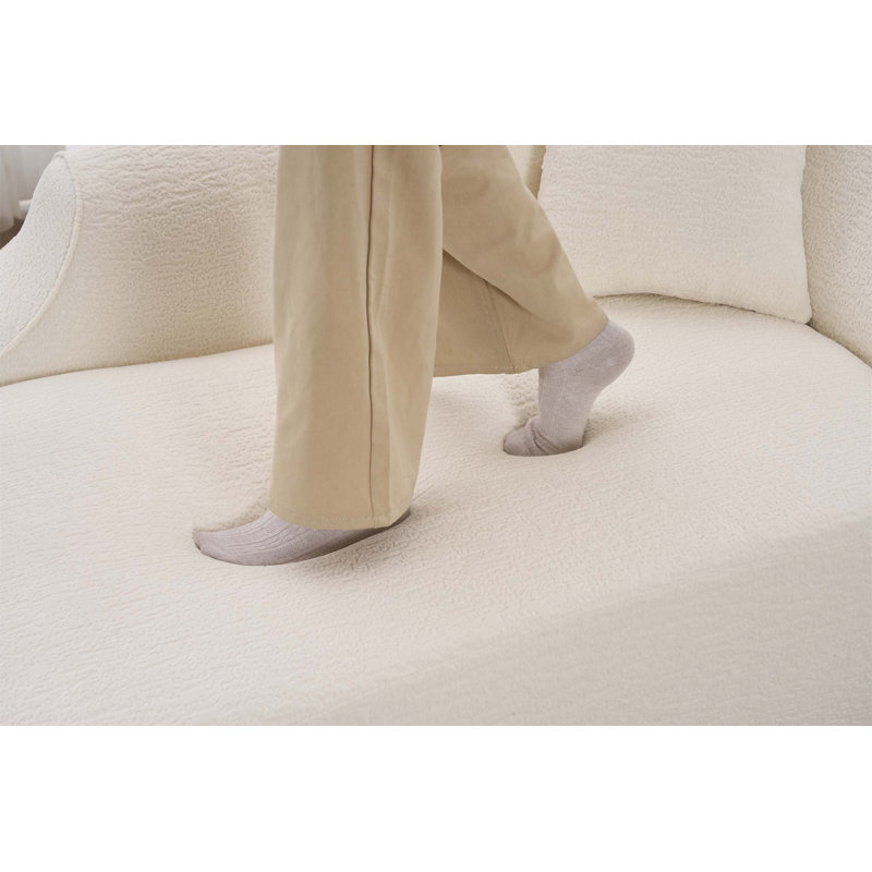 Chaise longue en chenille moderne avec assise profonde et coussin assorti, parfaite pour le salon ou la chambre à coucher