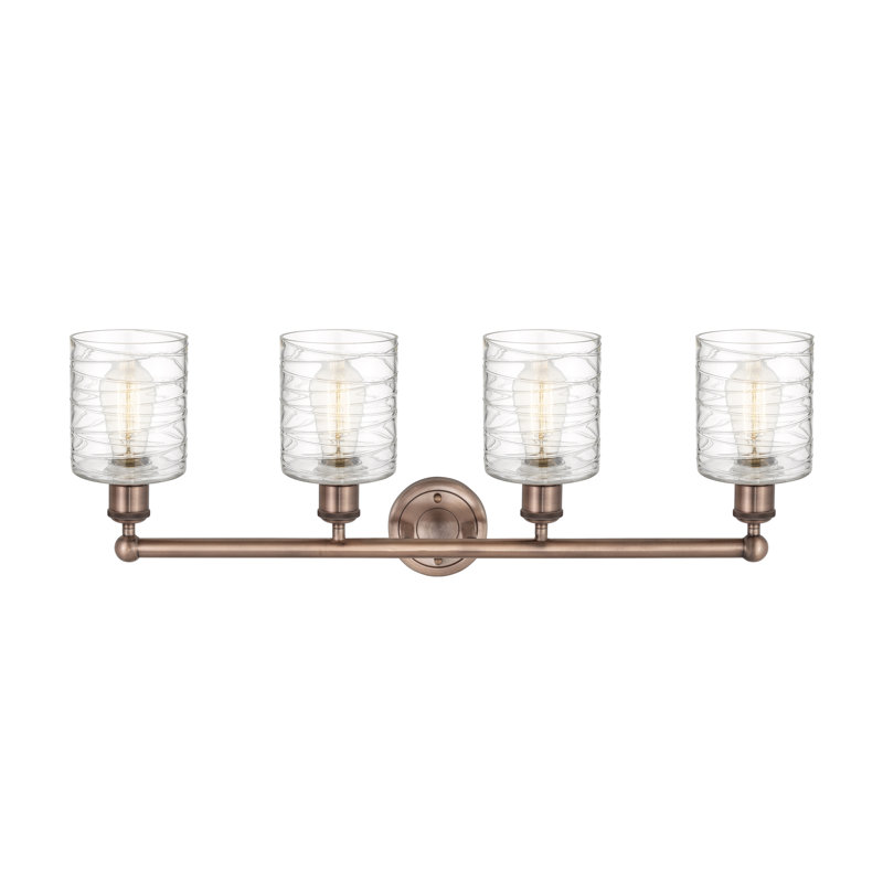 Karon 4 - Light Dimmable Vanity Light, Deco Swirl, Antique Copper