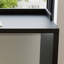 Bureau d'angle moderne et simple en forme de L noir-129294078-129294077
