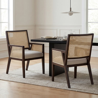 Calira Mid-Century Coastal Rubberwood Rattan Upholstered Dining Chair with Armrests and Cushioned Seat