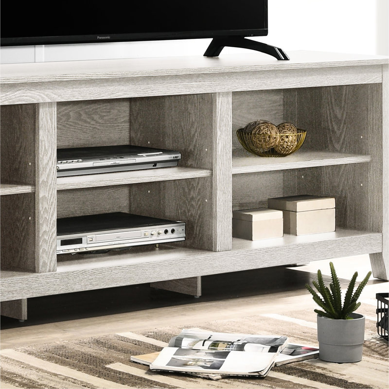 Meuble télé gris à panneau de particules, capacité de 70 à 79 pouces, conception de tablette ouverte, gestion des câbles, pieds multiples, tablettes réglables, 6 découpes, plateau de table gris de 0,59 po, plateau de jeu, hauteur des pieds 2,75 po, tablettes en H 7 po