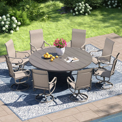 Ensemble repas de patio rond de 60 po avec chaises en textil Hereth 