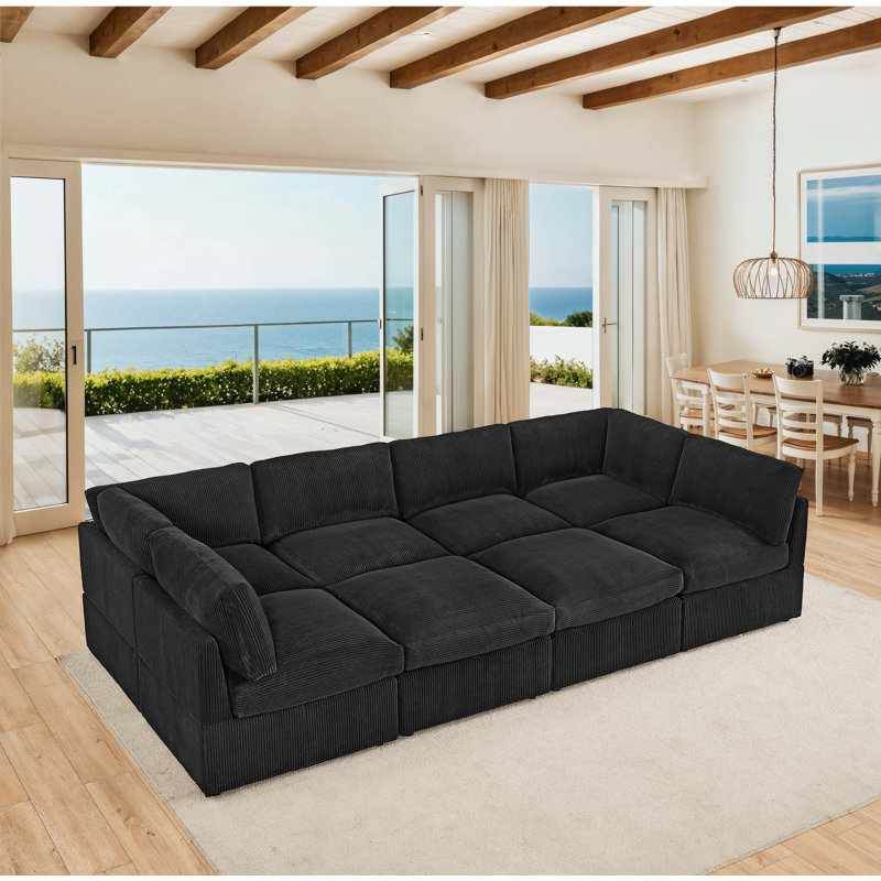 Arvill Amuri 129'' Wide Symmetrical Modular Corner Sectional with Ottoman, Black