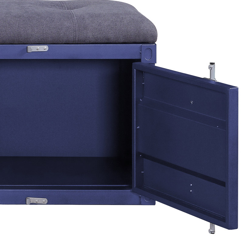 Banc industriel rembourré gris avec portes en métal bleu et accessoires de rangement pratiques