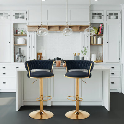 Paulyne Swivel Upholstered Adjustable Height Counter Stool with Metal Frame