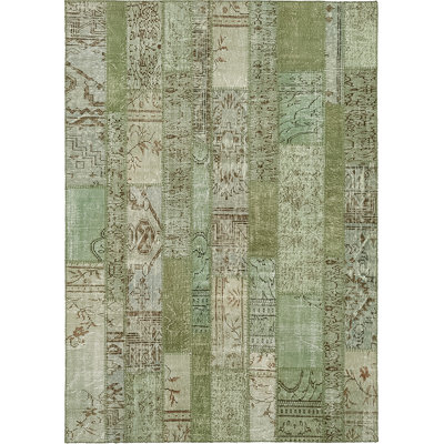Tapis vert en coton noué à la main