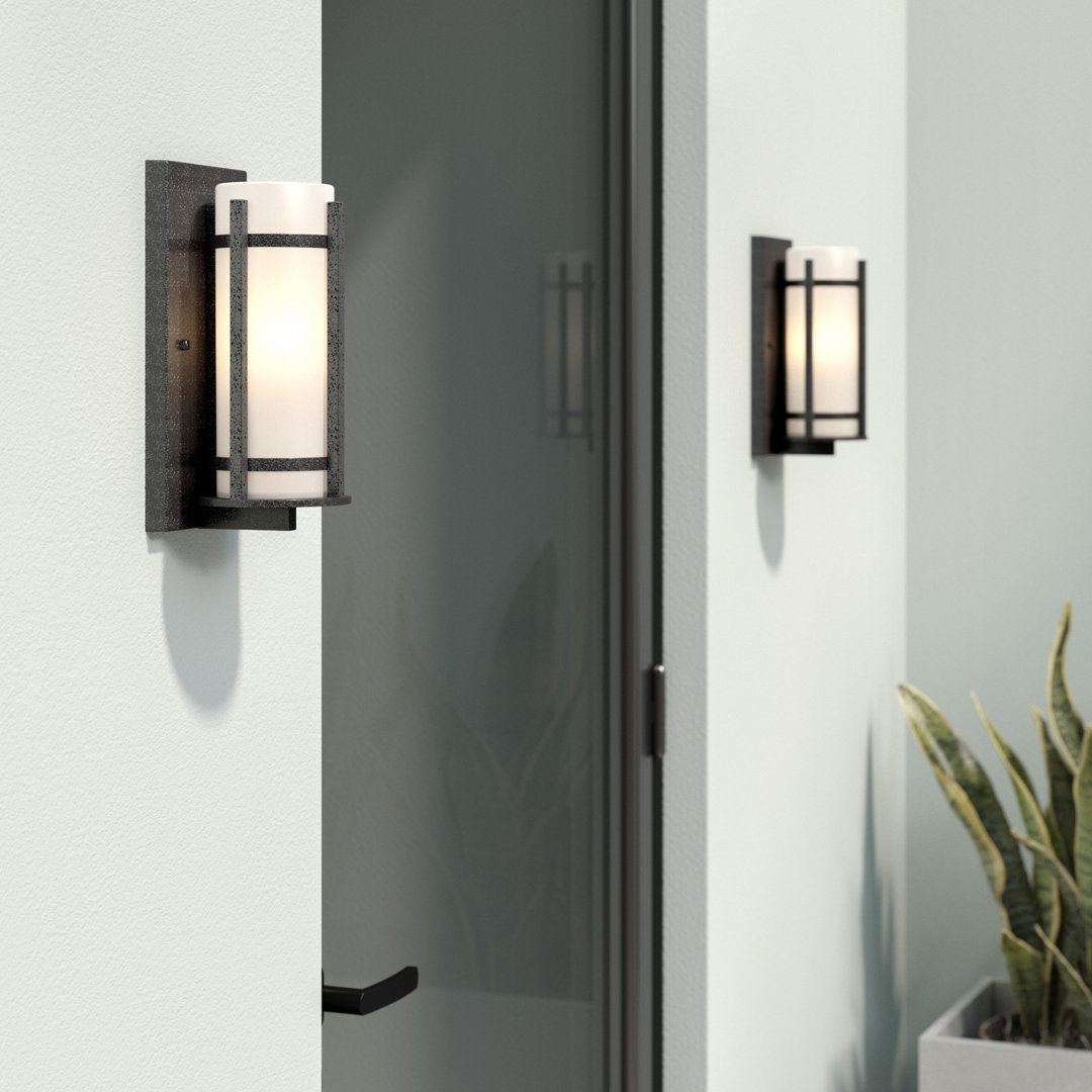Millbourne Anvil Iron 1 - Bulb Outdoor Armed Sconce Latitude Run®
