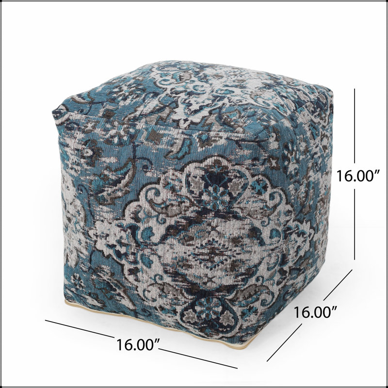 Pouf carré Anita, repose-pieds polyvalent et élégant pour une assise confortable et une touche décorative dans n'importe quelle pièce.
