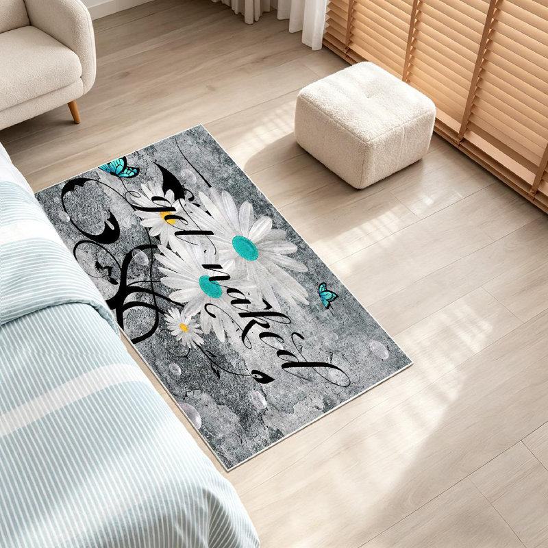 Tapis gris gris à motif de marguerites grises