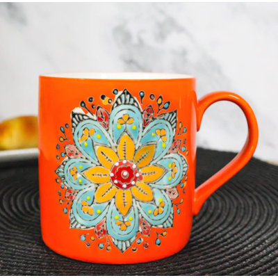 Tasse en forme de cercle mandala orange et zen