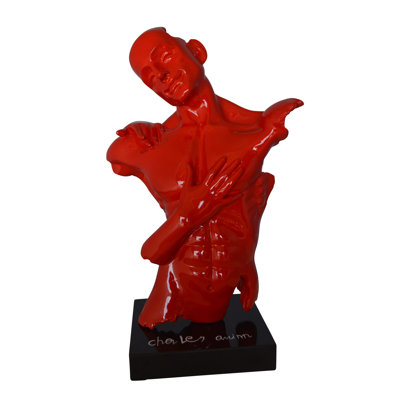 Winne Modern resin statue of a man hugged by a woman -  Size: 17"L x 8"W x 24"H.