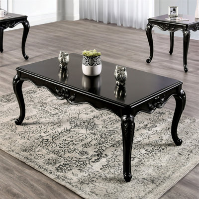 Table basse de style traditionnel avec pieds incurvés en bois massif