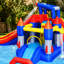 Jardin gonflable avec parc aquatique gonflable 10 en 1 avec piscine Splash et pistolet à eau et mur d'escalade et basketball