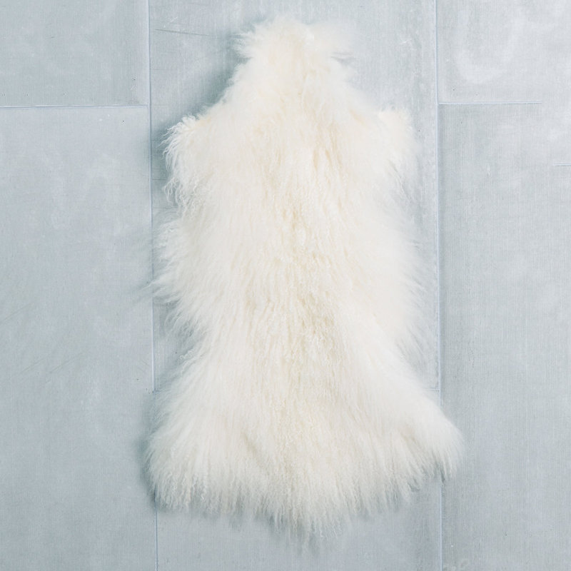 Tapis crème en fourrure d'agneau de Mongolie