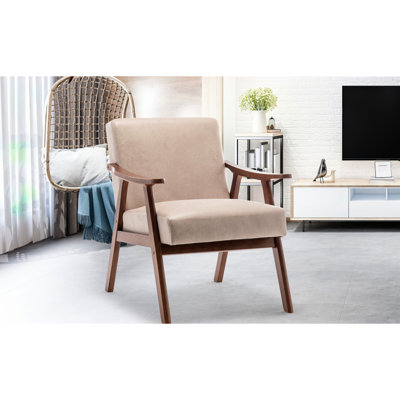 Fauteuil lounge à structure en bois massif, rembourrage moelleux et charme classique pour une détente optimale. Meuble d'appoint polyvalent pour les espaces intérieurs. Siège spacieux et style élégant.