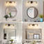 Luminaire de salle de bain moderne à 3 lumières noir et bronze avec abat-jour en verre transparent, appliques murales E26 au-dessus du miroir pour le couloir de la chambre à coucher du salon (ampoule non incluse)