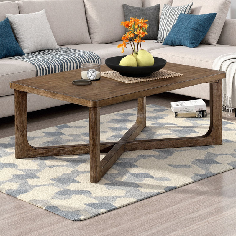 Table basse moderne moderne avec finition brun clair et base en X robuste - Table basse en bois