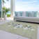 Machine Washable Indoor/Outdoor Christmas Presents Xhevrie Aloe Rug