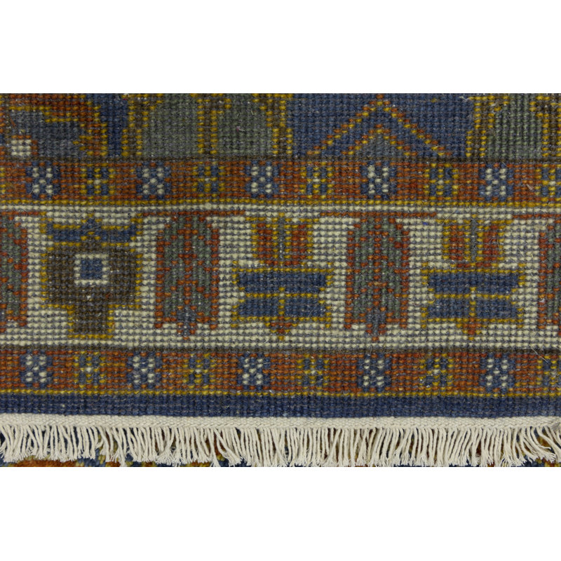 Tapis bleu / brun en laine noué à la main