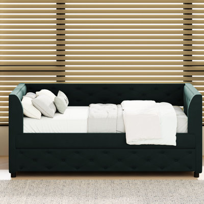 Lit de jour simple avec revêtement en velours et porte-revues