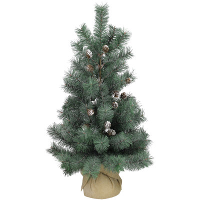 Faux arbre avec pommes de pin - Arbre livré avec des branches pliées et nécessitant un arrangement des membres.