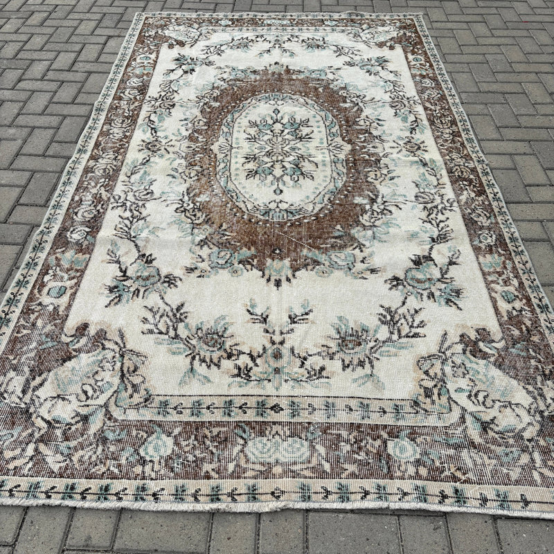 Tapis en laine beige élégant Elegant